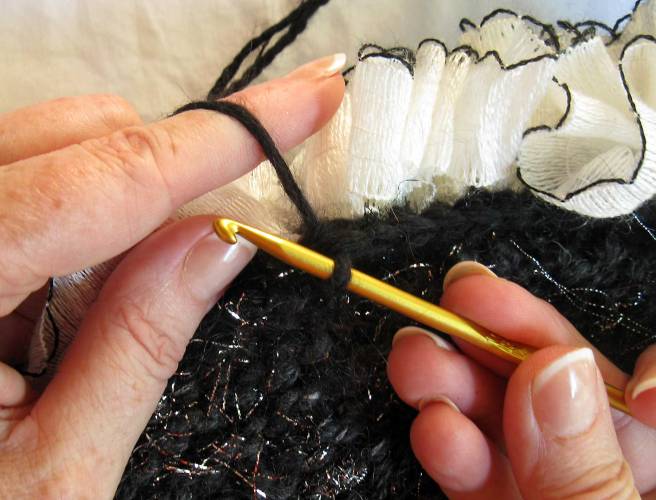 Step 6: Pull yarn through 2 loops to complete sc.