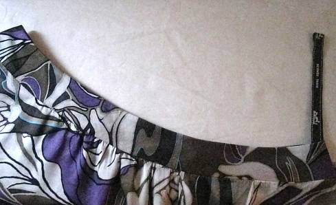 Hanging strap on tunic