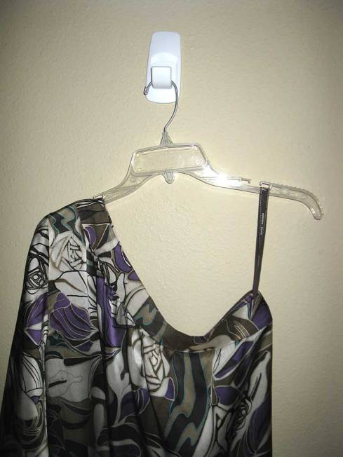 Tunic on hanger, with hanging strap