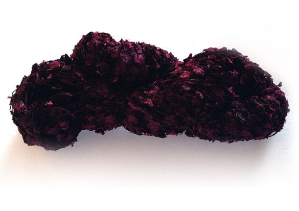 Garnet in Ticklish (100% nylon novelty flag yarn). Click the photo to see this yarn in my Etsy shop.